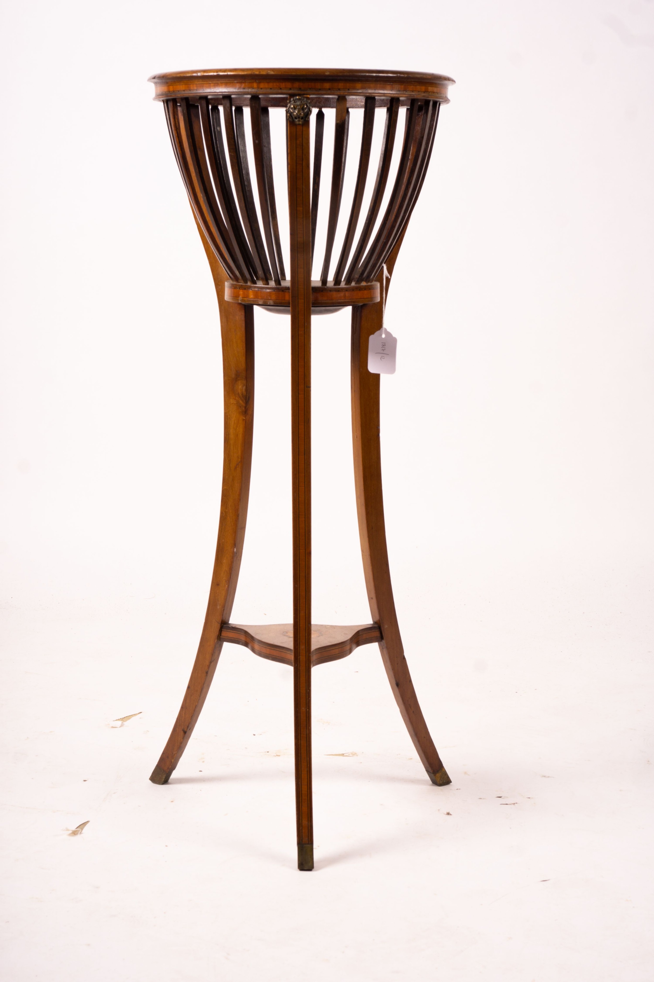 An Edwardian mahogany jardiniere stand, height 91cm